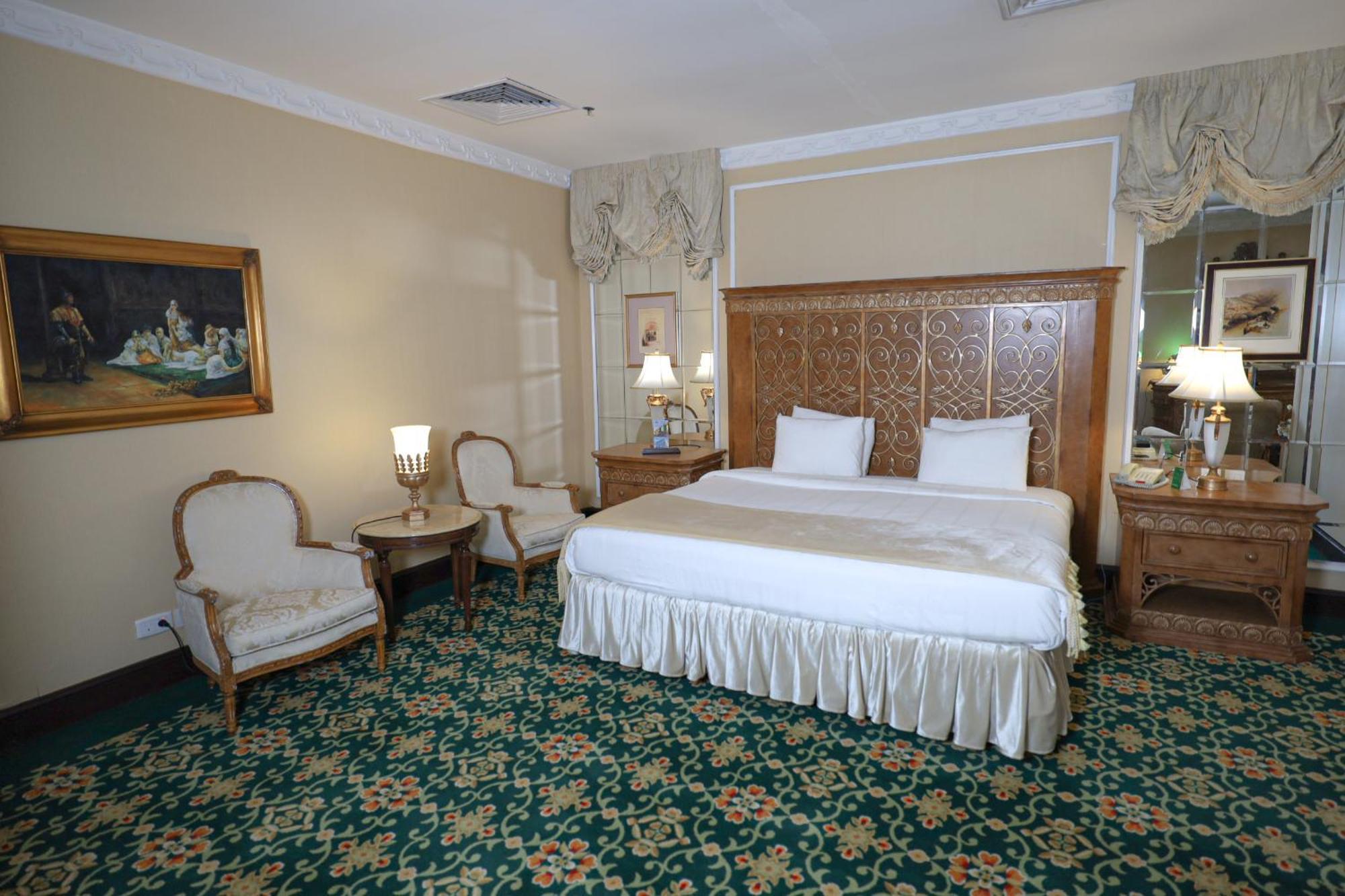 Habitat All Suites, Αλ Κομπάρ Εξωτερικό φωτογραφία A bedroom at the hotel